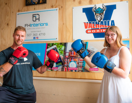 MoMac showcasing their graphic design at Valhalla Boxing in Rangiora