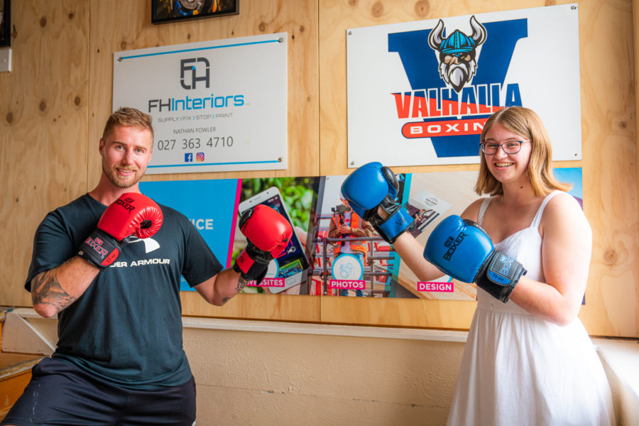 MoMac showcasing their graphic design at Valhalla Boxing in Rangiora